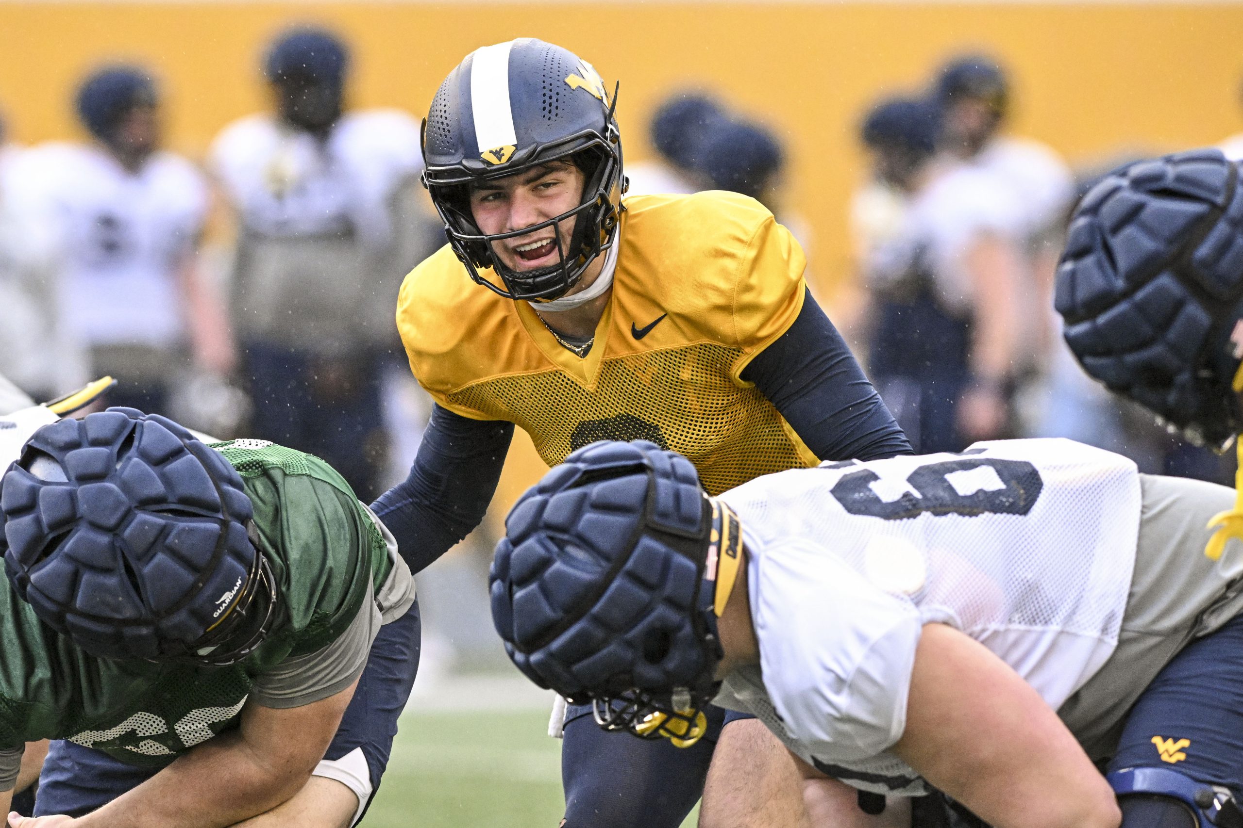 WVU hits first snag in quarterback competition